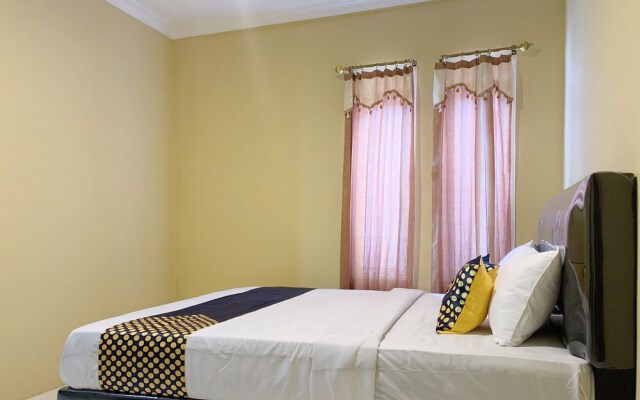 Mande Guesthouse by RedDoorz