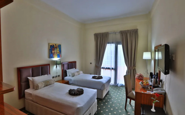 Kenenisa.. Oasis International Hotel