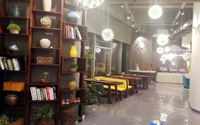 Rose Art Hotel (Ningbo Beilun Yintai City Store)
