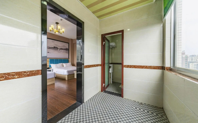 an you Bussiness Hotel(遂溪安由商务酒店)