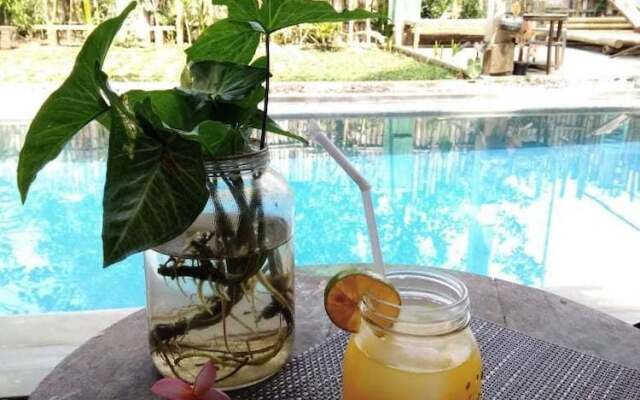 Omah Kulon Cabins and Pool