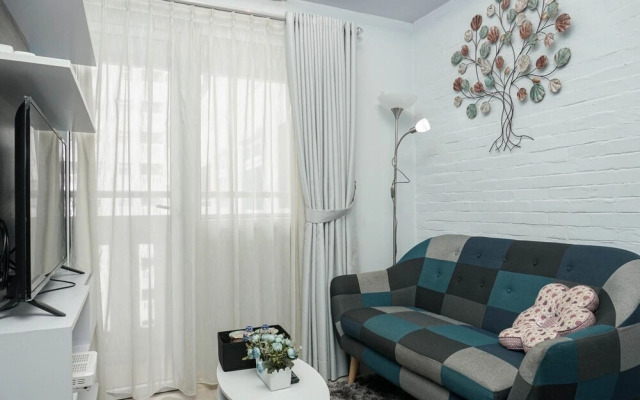 Relaxing and Warm 2BR @ Green Pramuka City Apartment