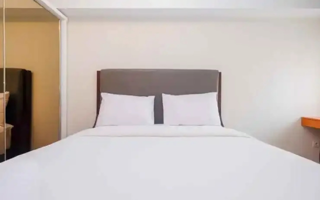 Homey 2BR with Pool View Apartment @ Springlake Summarecon By Travelio