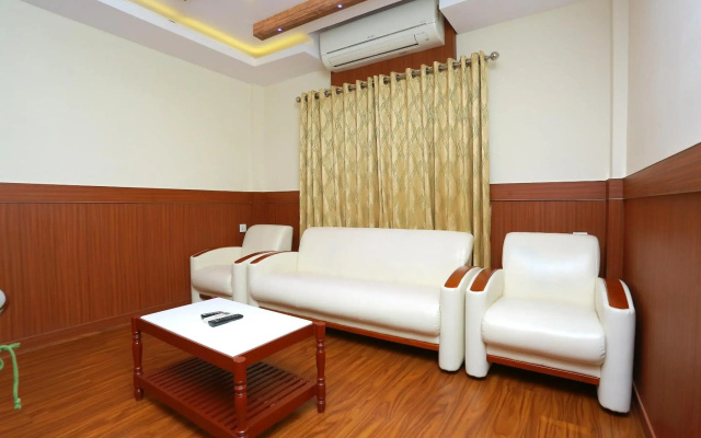 Capital O 14702 Kovilakam Residency