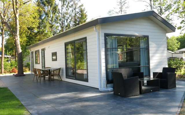 Modern chalet with two terraces and near a pond