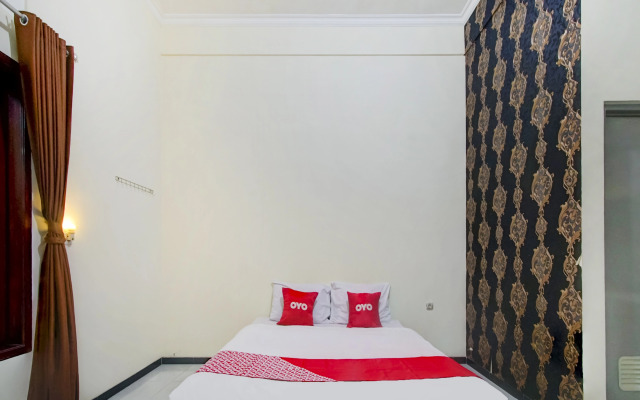 Capital O 90151 Guest House 180