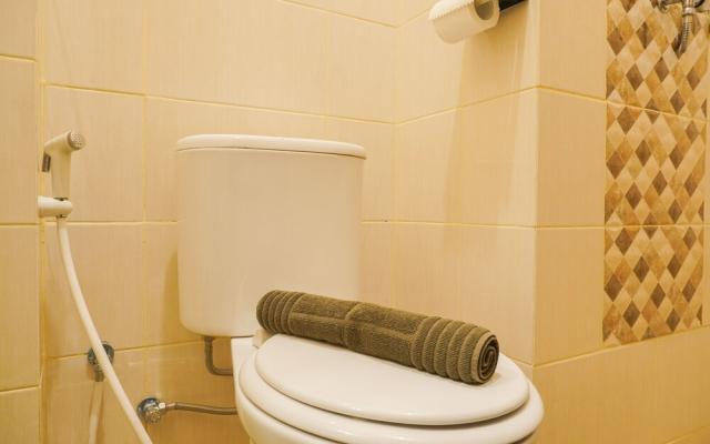 Homey and Cozy Living Studio Room at Dave Apartment