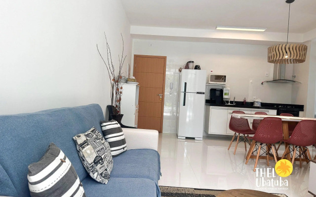 Apto completo e confortável com roupa de cama nas Toninhas  Condomínio Lumière