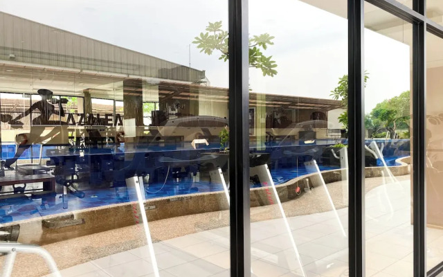 Modern Look and Restful Studio at Azalea Suites Apartment