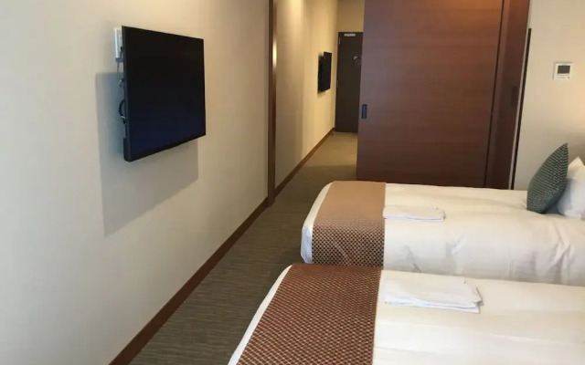 Odysis Suites Osaka Airport Hotel