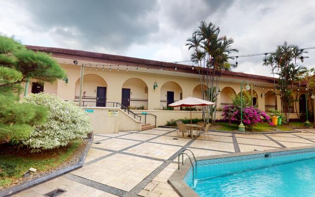 Capital O 1662 Ole Suites Hotel