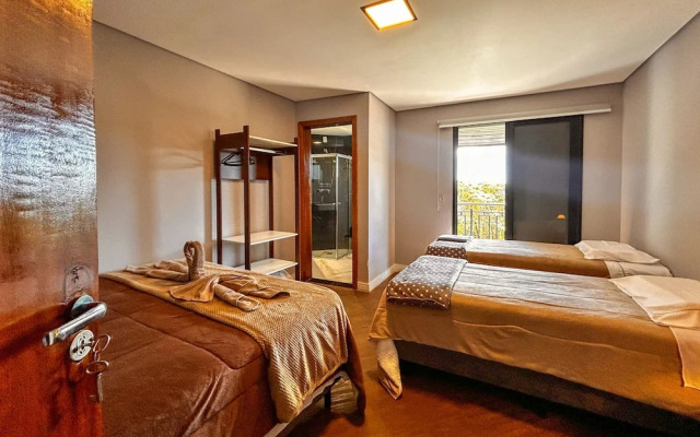 Casa com 4 Su tes Jacuzzi e Lareira Externa