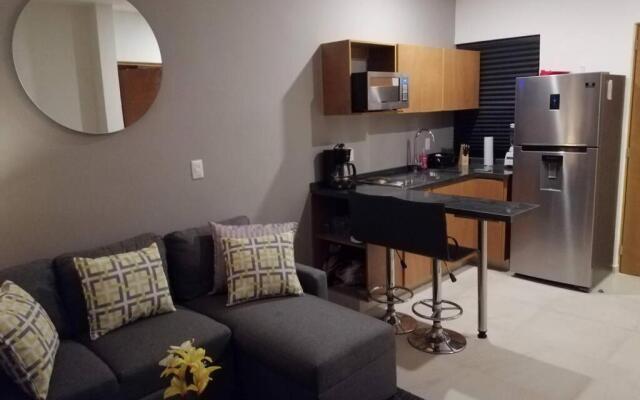 Modern 1 bedroom suite by beach Great location!