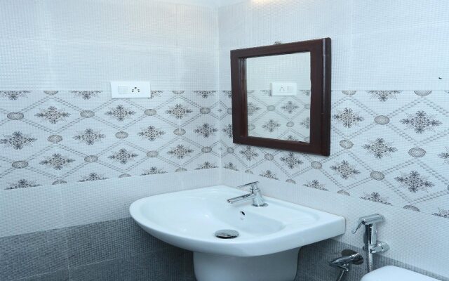 Nedumparambil Residency By OYO Rooms