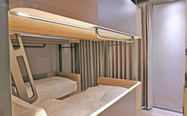 Kiwi Share Hotel - Zhongli Station Branch - Hostel