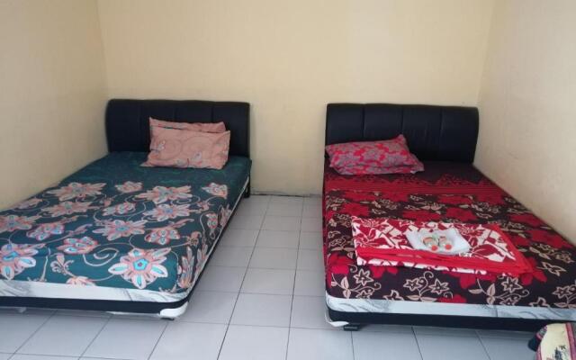 Spot On 91249 Baroqah Guest House