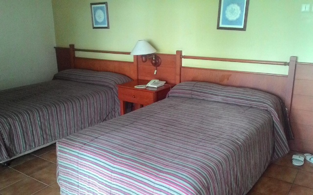 Gunung Geulis Cottages managed by Royal Tulip – Guest Rooms – Megamendung