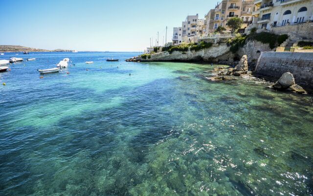 Blue Harbour 4 Seafront apartment by Getaways Malta