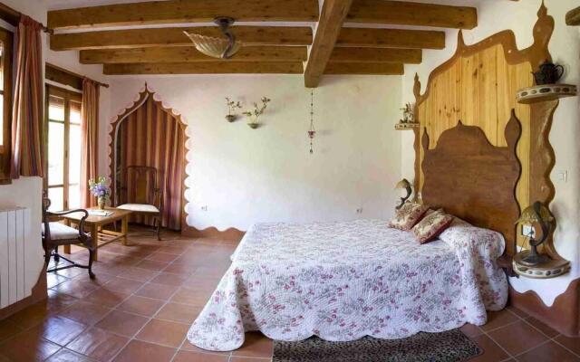 Masía La Posada del río Carbo