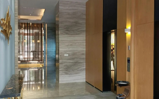 Mangshi Bailongshe Hotel (Dehong Mangshi Airport Dehong Mangshi Square Branch)