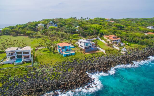 Stunning Coral View Home with Oceanfront Pool by RedAwning