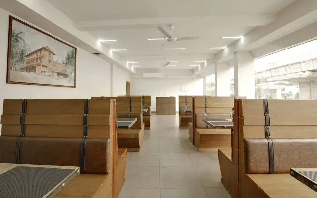 Capital O 22459 Edasserys Kalamassery Tourist Home
