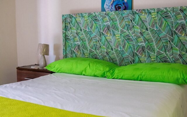 Tropical Breeze Guesthouse and Furnished Apartments