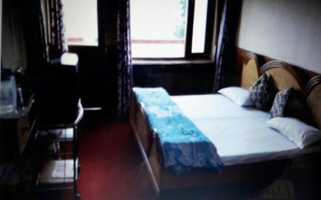 Tribhuvan Ranikhet by Goroomgo