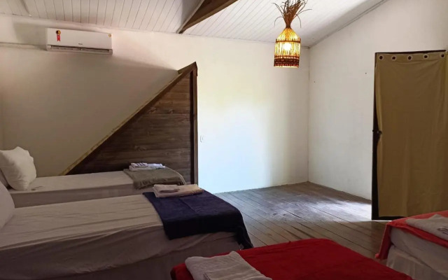 Canoa Hostel e Suites