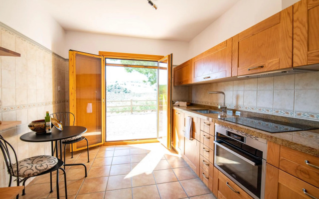 Casa Grande / Rosas Cantares