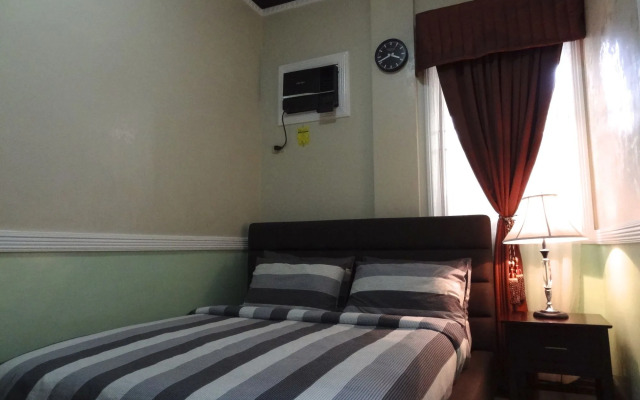 The Executive Villa Inn & Suites