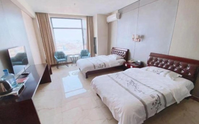 Huanle Business Hotel