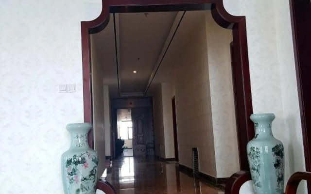 Huanle Business Hotel