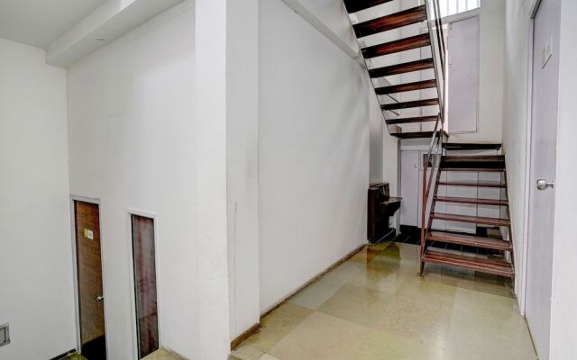Fabhotel Vardhan House