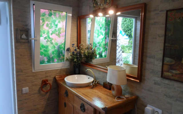 Casa con jardín frente Playa de Burriana