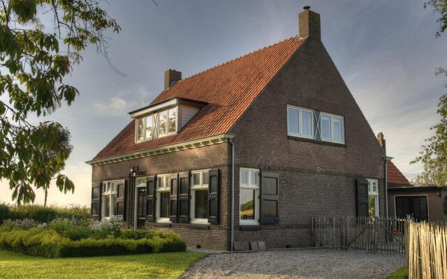 Spacious Farmhouse in IJzendijke with Garden