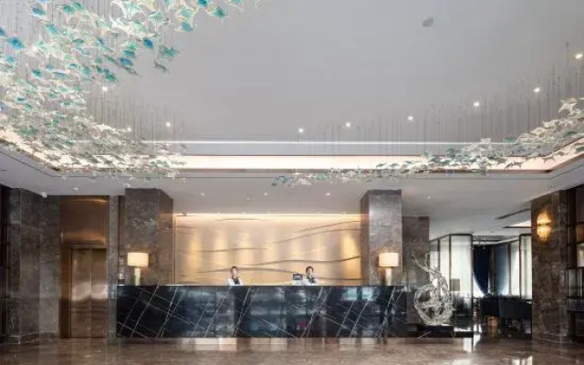Chengjie Business Hotel (Wanning City Center High-speed Railway Station)