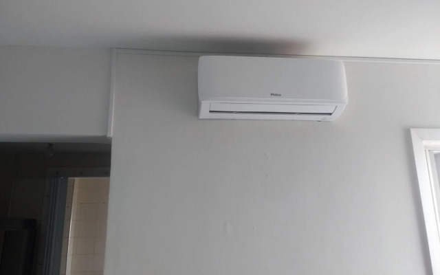 Suíte com Cozinha independente em Apartamento