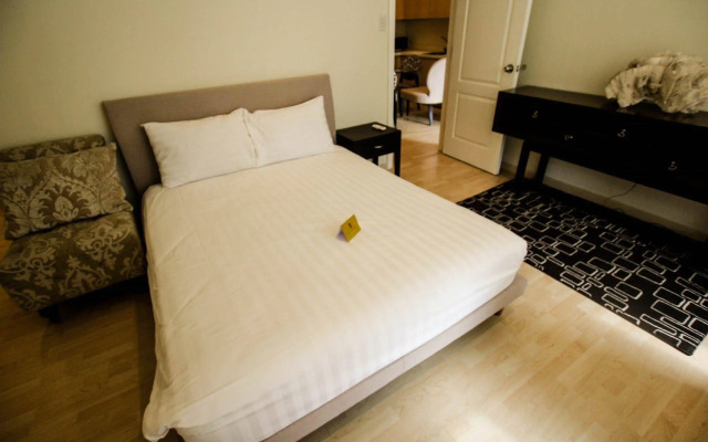 SIGLO SUITES @ The Gramercy Residences
