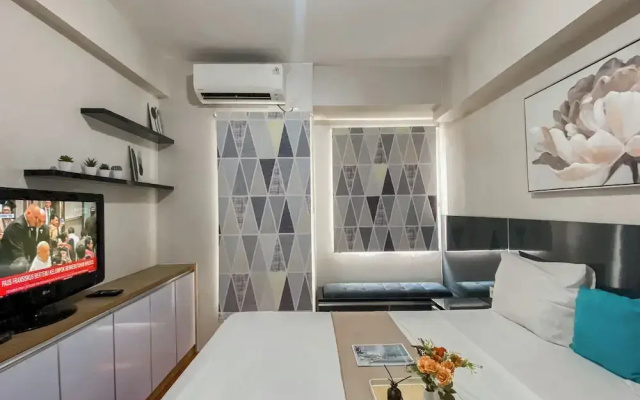 Warm and Homey Studio at Podomoro Golf View Apartment