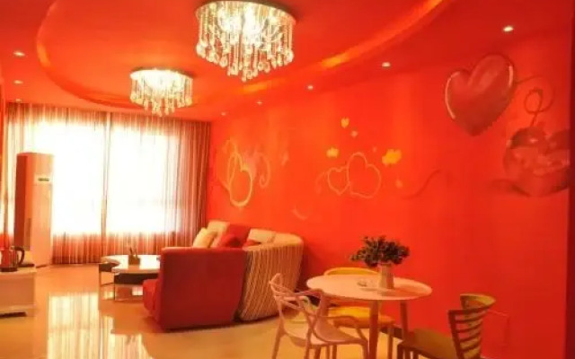Huazhong Theme Apartment Hotel
