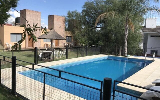 Aguaribay Apart Cabañas