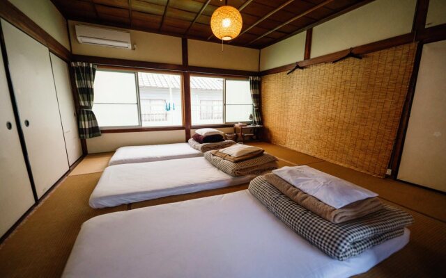 Guesthouse Momonga Village - Hostel