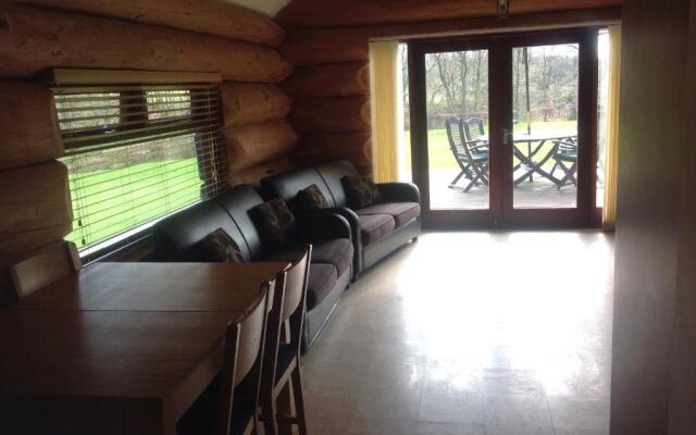 lyne view, log cabin