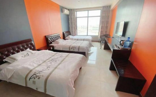 Huanle Business Hotel