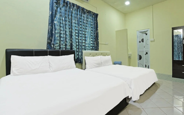 Oyo 90596 Casaria Inn