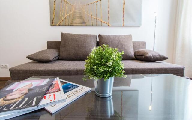 Design Apartments I contactless check-in