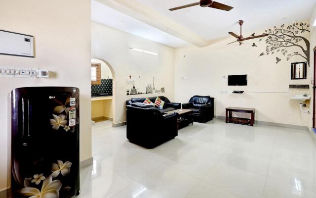 OYO 78180 2BHK Compact Home Near Promenade Beach