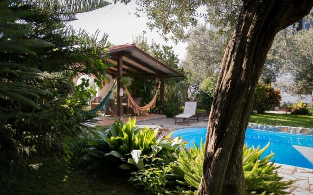 Appartamento in Villa con Giardino privato e piscina