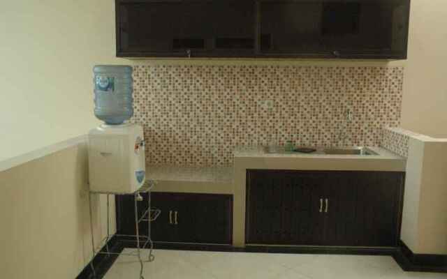 OYO 3810 D'yolland Exclusive Kost & Guesthouse Syariah